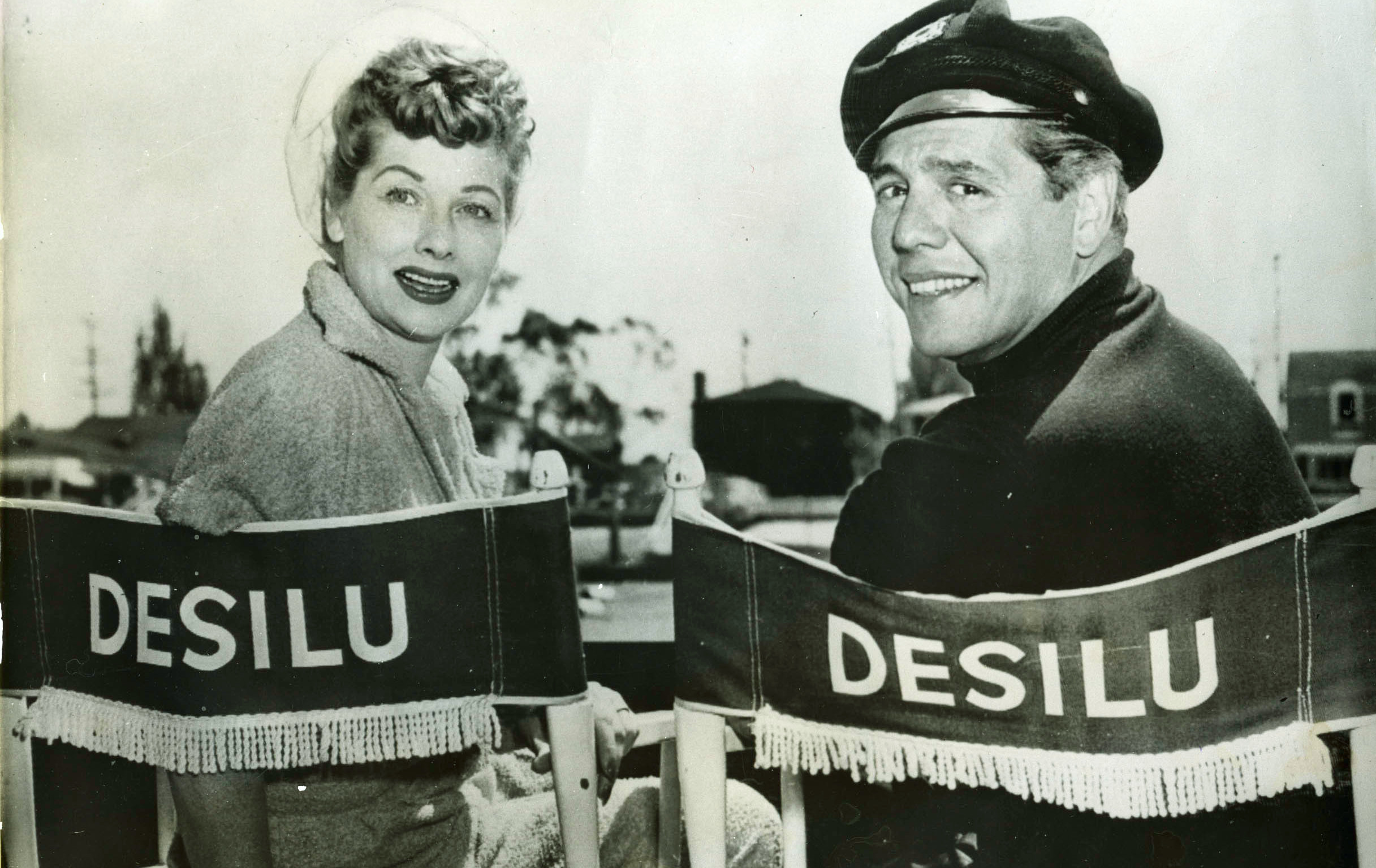 Lucille Ball & Desi Arnaz in directors chairs, I Love Lucy Fast Facts